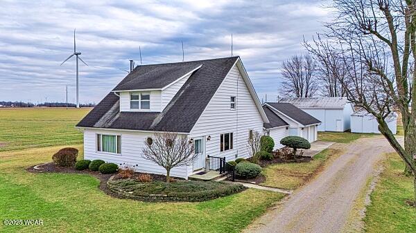 view of property exterior with a yard