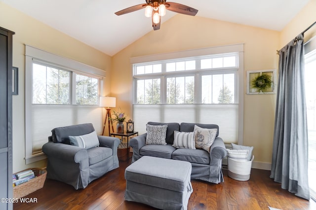 living room with lofted ceiling, dark wood-type flooring, and ceiling fan