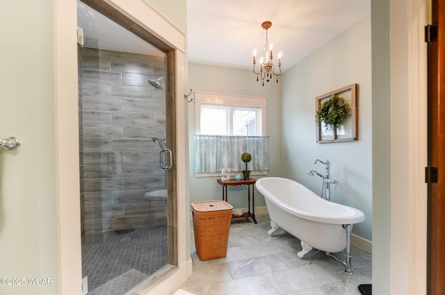 bathroom featuring separate shower and tub, tile patterned floors, and a chandelier