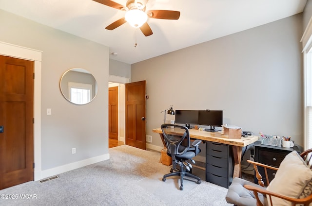 home office with light colored carpet and ceiling fan