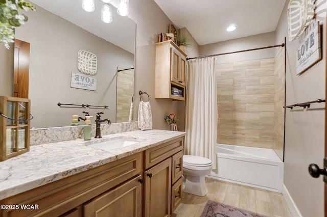 full bathroom featuring vanity, shower / bathtub combination with curtain, and toilet