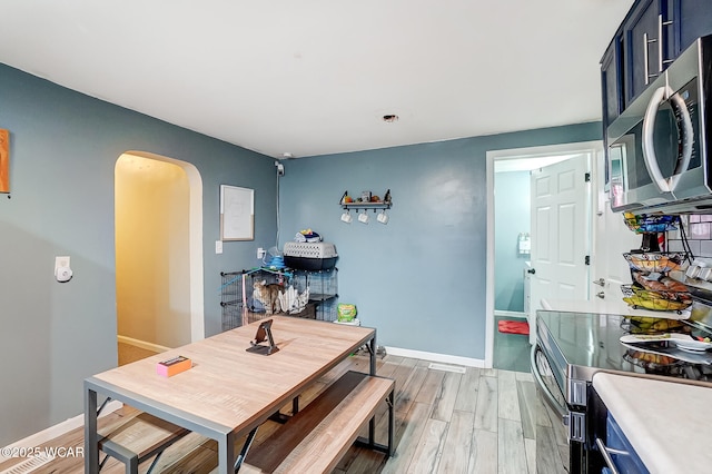 dining room with light hardwood / wood-style flooring