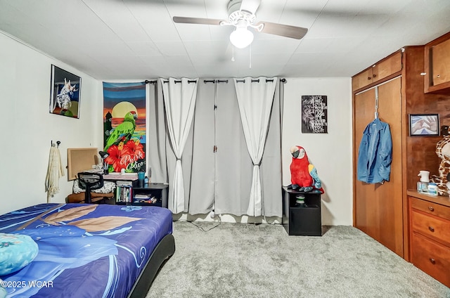 carpeted bedroom featuring ceiling fan