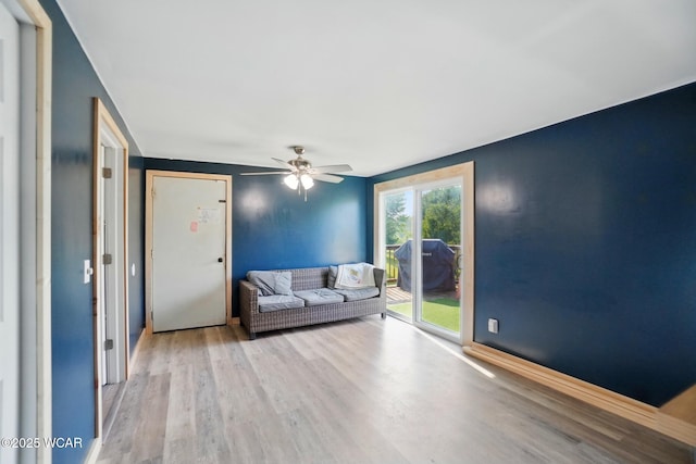 442 N Phillips Rd, Harrod, OH 45850 - living room with wood finished floors and ceiling fan