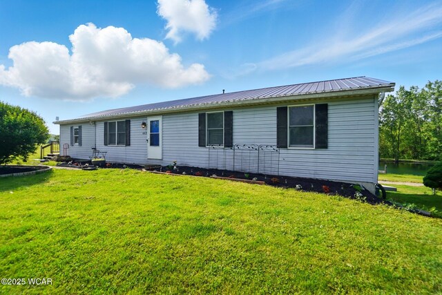 442 N Phillips Rd, Harrod, OH 45850 - view of front facade featuring a front lawn and metal roof