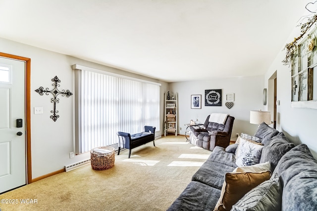 living room featuring carpet, baseboards, and a wealth of natural light