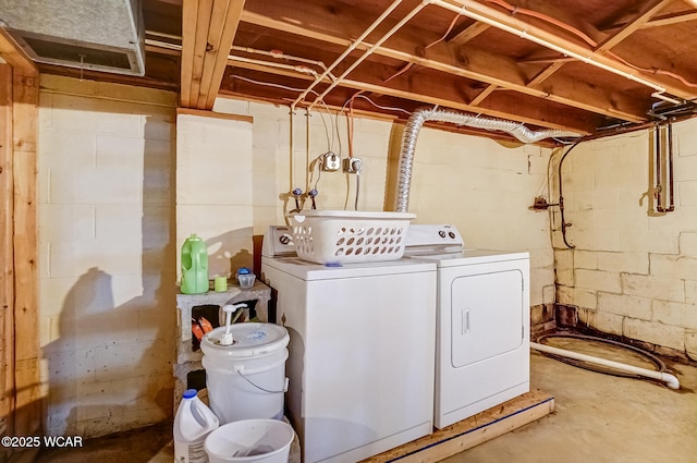 laundry room with laundry area and separate washer and dryer