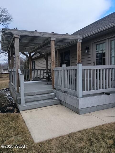 wooden terrace featuring a pergola