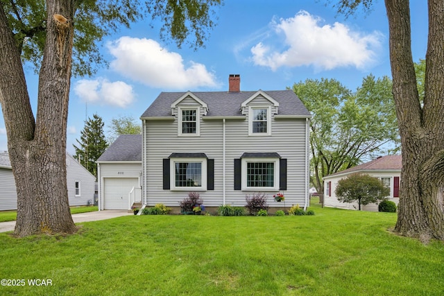 800 S Tyler St, Van Wert, OH 45891 - view of front of property featuring a chimney, an attached garage, a front lawn, driveway, and roof with shingles
