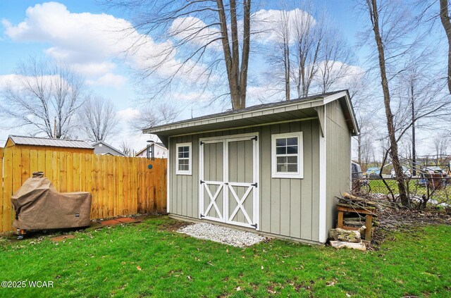 351 Prater St, Russells Point, OH 43348 - view of shed with a fenced backyard