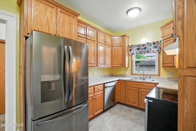 210 N Pierce St, Delphos, OH 45833 - kitchen with appliances with stainless steel finishes, custom exhaust hood, light countertops, and light wood-type flooring