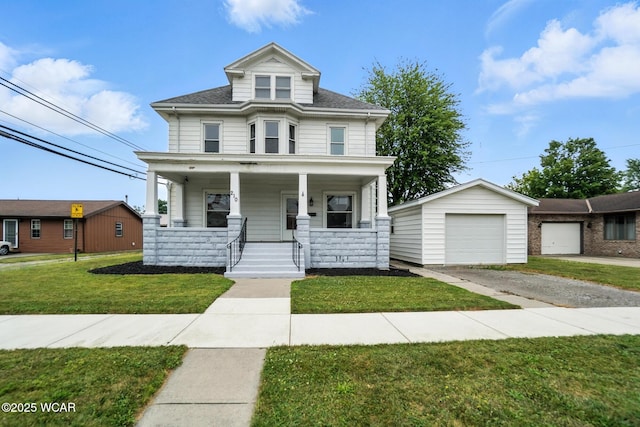 210 N Pierce St, Delphos, OH 45833 - traditional style home featuring covered porch, driveway, a front lawn, an outdoor structure, and a detached garage