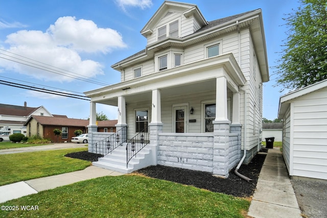 210 N Pierce St, Delphos, OH 45833 - traditional style home featuring covered porch and a front lawn