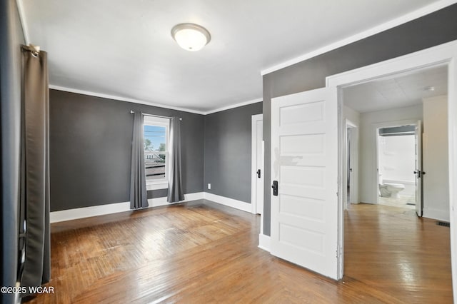 210 N Pierce St, Delphos, OH 45833 - unfurnished room featuring crown molding and wood finished floors