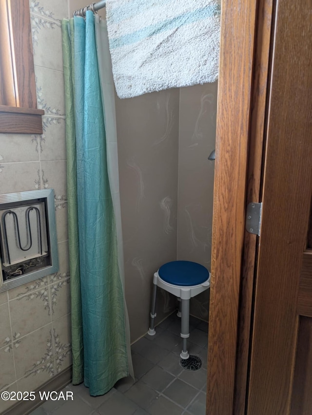 full bathroom with tile patterned floors