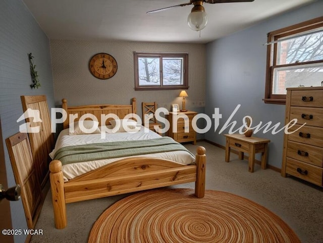 6915 Poling Rd, Lima, OH 45807 - carpeted bedroom with a ceiling fan