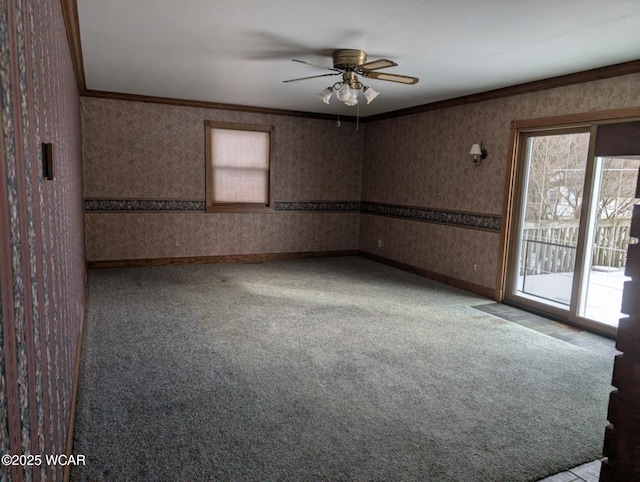 unfurnished room with ornamental molding, carpet, baseboards, and wallpapered walls