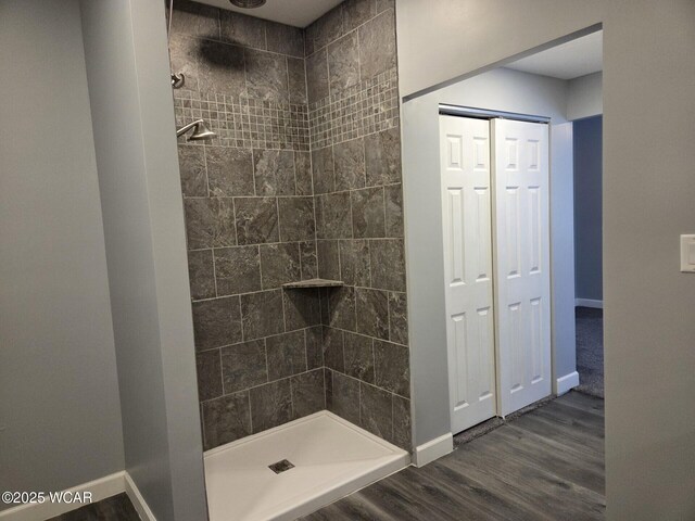 220 W N St, Elida, OH 45807 - full bath featuring tiled shower and wood finished floors
