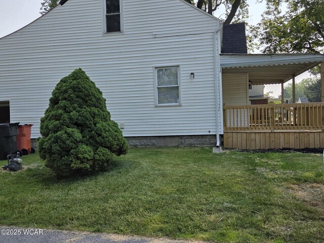 220 W N St, Elida, OH 45807 - view of home's exterior with a lawn