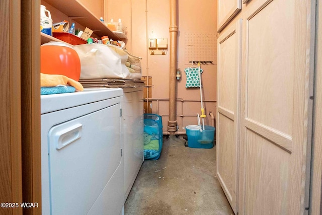 washroom with independent washer and dryer