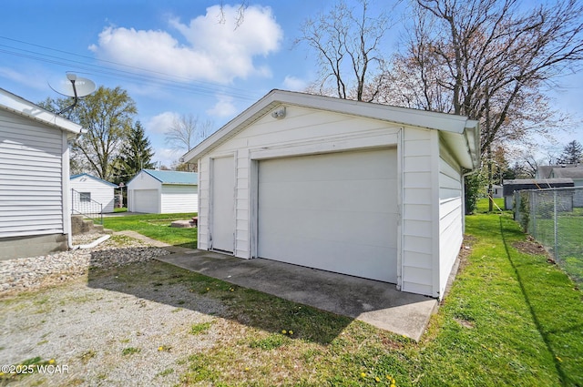 detached garage with fence