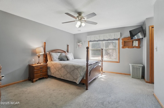 1543 Wonderlick Rd, Lima, OH 45805 - bedroom with baseboards, a ceiling fan, and carpet