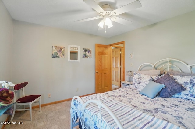 1543 Wonderlick Rd, Lima, OH 45805 - bedroom featuring ceiling fan, baseboards, and light carpet