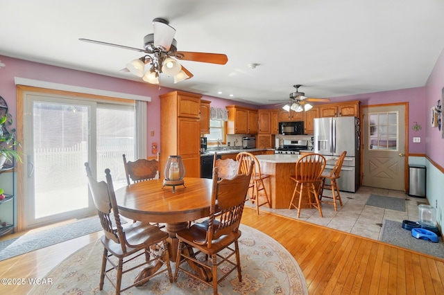 1543 Wonderlick Rd, Lima, OH 45805 - dining space with a ceiling fan and light wood-type flooring