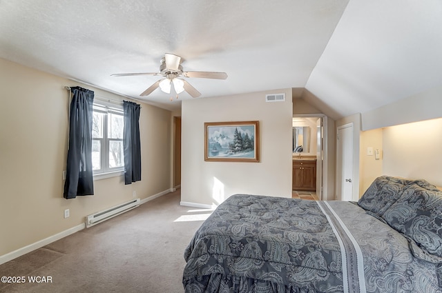 bedroom with vaulted ceiling, carpet flooring, ensuite bathroom, ceiling fan, and a baseboard radiator