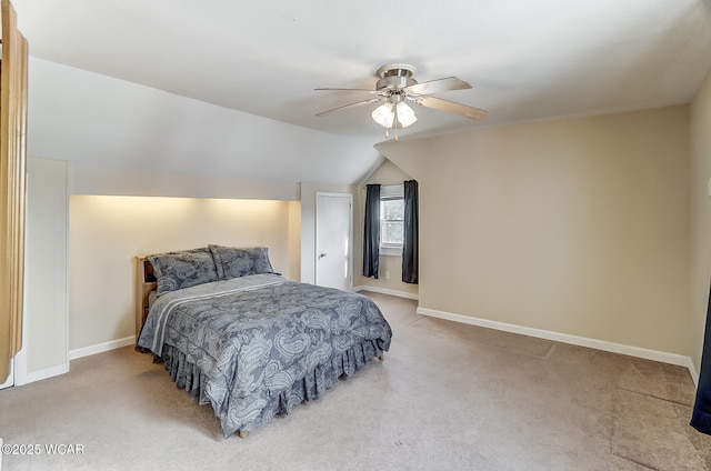 bedroom featuring lofted ceiling, ceiling fan, and carpet floors