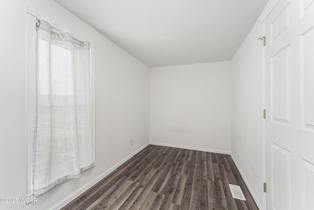 11820 County Road 17, West Unity, OH 43570 - spare room featuring dark wood-type flooring
