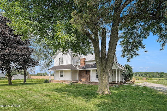 11820 County Road 17, West Unity, OH 43570 - view of front of property with covered porch and a front lawn