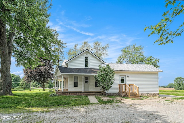 11820 County Road 17, West Unity, OH 43570 - view of front of home featuring a front lawn