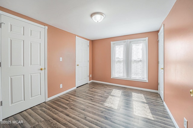 11820 County Road 17, West Unity, OH 43570 - spare room featuring baseboards and wood finished floors