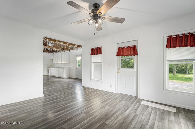 11820 County Road 17, West Unity, OH 43570 - unfurnished living room featuring dark wood finished floors and a ceiling fan