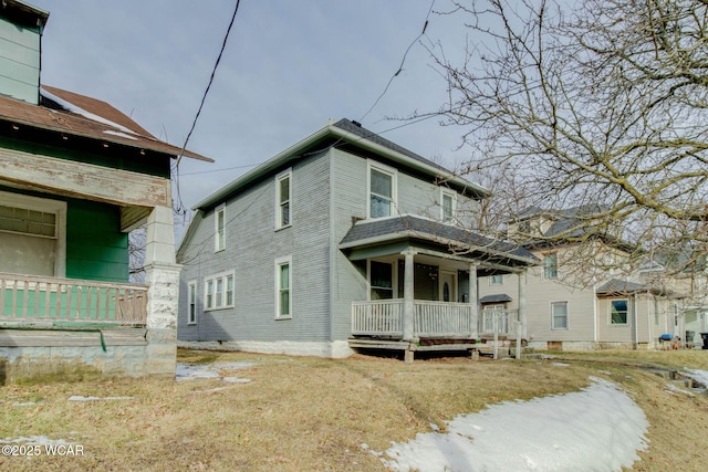 view of property exterior with a porch