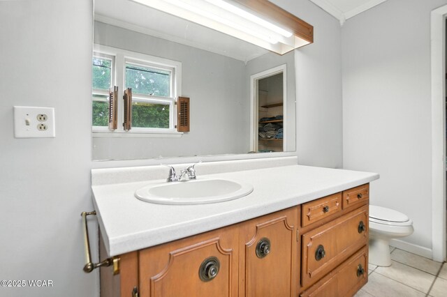 307 N Jefferson St, Van Wert, OH 45891 - bathroom featuring vanity, tile patterned flooring, and crown molding