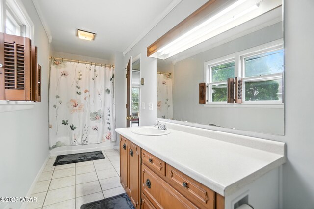 307 N Jefferson St, Van Wert, OH 45891 - bathroom featuring vanity, tile patterned floors, and ornamental molding