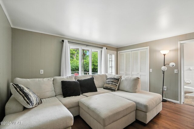 307 N Jefferson St, Van Wert, OH 45891 - living area featuring crown molding and dark wood-style floors