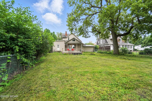 307 N Jefferson St, Van Wert, OH 45891 - fenced backyard featuring a wooden deck