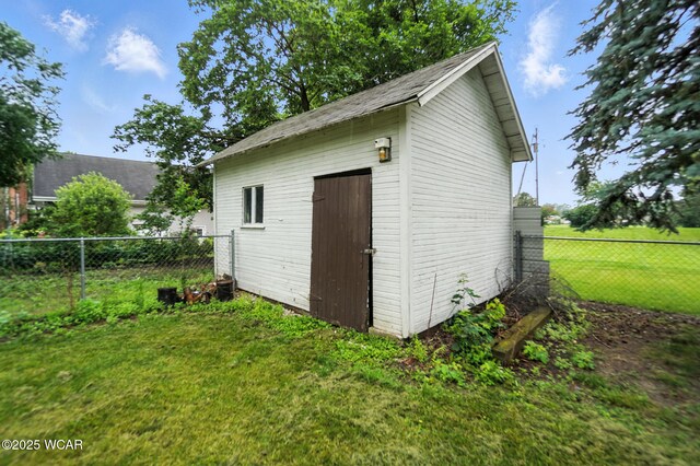 307 N Jefferson St, Van Wert, OH 45891 - view of shed featuring a fenced backyard