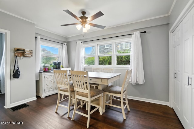 307 N Jefferson St, Van Wert, OH 45891 - dining space featuring dark wood-style floors, a ceiling fan, and crown molding