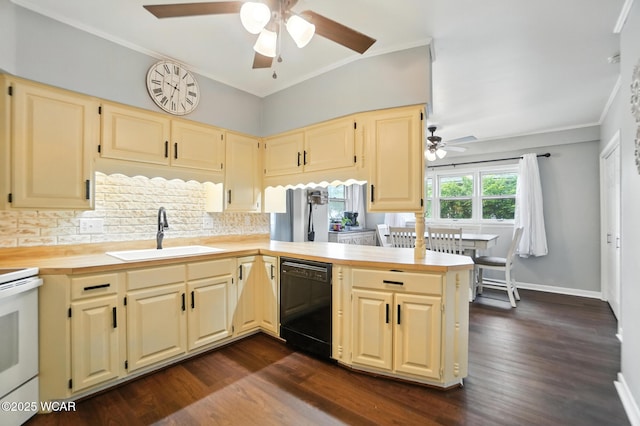 307 N Jefferson St, Van Wert, OH 45891 - kitchen with dishwasher, a ceiling fan, light countertops, tasteful backsplash, and crown molding