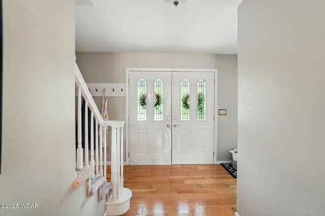 2357 London Dr, Lima, OH 45805 - entrance foyer featuring stairway and wood-type flooring