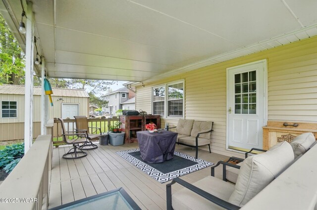 2357 London Dr, Lima, OH 45805 - wooden terrace featuring outdoor lounge area