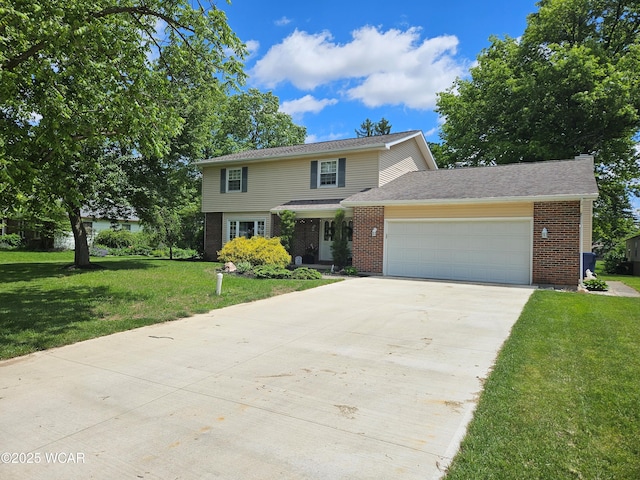2357 London Dr, Lima, OH 45805 - view of front of house featuring a garage, brick siding, a front yard, and concrete driveway