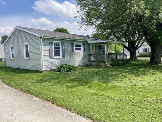 635 Stevens St, Kenton, OH 43326 - view of front of house featuring a front yard and covered porch