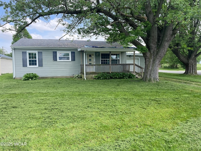 635 Stevens St, Kenton, OH 43326 - ranch-style house featuring a front yard and a porch