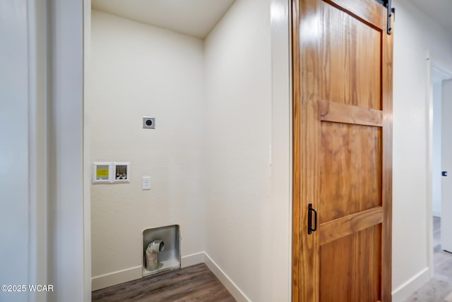 laundry room with hookup for a washing machine, baseboards, wood finished floors, laundry area, and electric dryer hookup