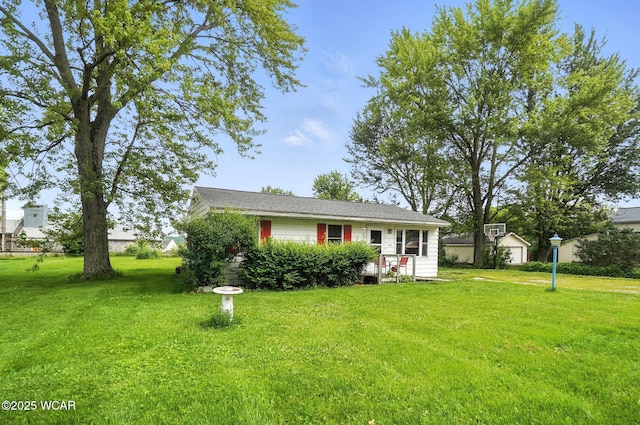5176 Norfolk St, Lima, OH 45806 - view of front of home with a front lawn and an outbuilding